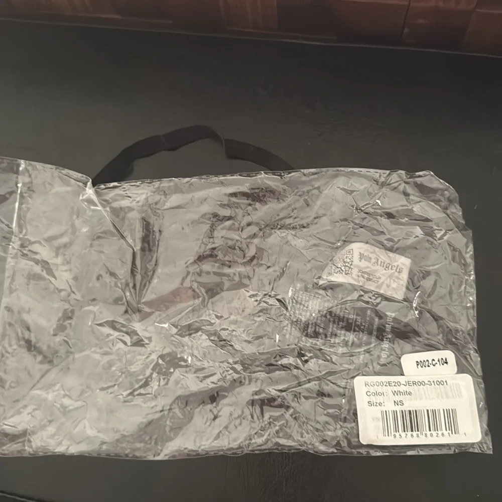Authentic palm angels face mask comes with original bag.